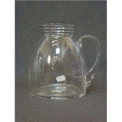A LALIQUE CLEAR GLASS WATER JUG, 'Yquem', loop handle, etched 'R.Lalique France' height 16cm  £80...