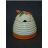 Image 1 : A CLARICE CLIFF HONEY POT, beehive shape, 'Marguerite' pattern, height 10cm, (hairline to cover)...