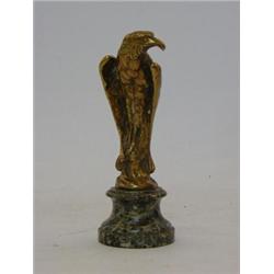 A CAST BRASS EAGLE PAPERWEIGHT, after A. Marionnes, on verte antique circular socle, height 12cm...