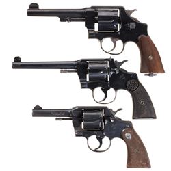 Three Double Action Revolvers -A) Smith & Wesson Model 1917 Army Revolver