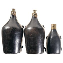 Three Large Leather Powder Flasks