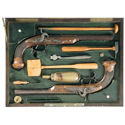 Cased Pair of Engraved and Gold Inlaid Parisian Percussion Pistols with Accessories -A) Dabat Pistol