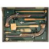 Image 1 : Cased Pair of Engraved and Gold Inlaid Parisian Percussion Pistols with Accessories -A) Dabat Pistol