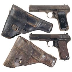 Two Tokarev Semi-Automatic Pistols with Holsters -A) Soviet TT-33 Pistol