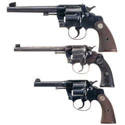 Three Colt Double Action Revolvers -A) Colt Officer's Model Heavy Barrel Double Action Revolver