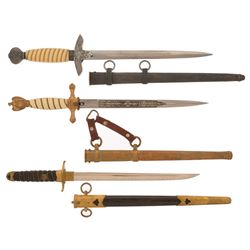 Three Military Daggers with Sheaths