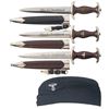 Image 1 : Three Nazi SA Style Daggers with Sheaths and an N.S.K.K. Marked Cap