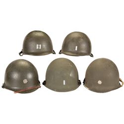 Five U.S. M1 Helmets, Including an Early Fixed Bale Shell