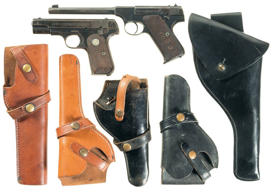 Two Colt SemiAutomatic Pistols and Grouping of Five Holsters A) Colt