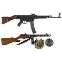 Two Inert Machine Gun Replicas