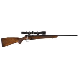 Tikka Model 695 Bolt Action Rifle with Scope