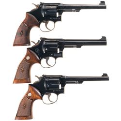 Three Smith & Wesson Double Action Revolvers -A) S&W .38 Hand Ejector Revolver