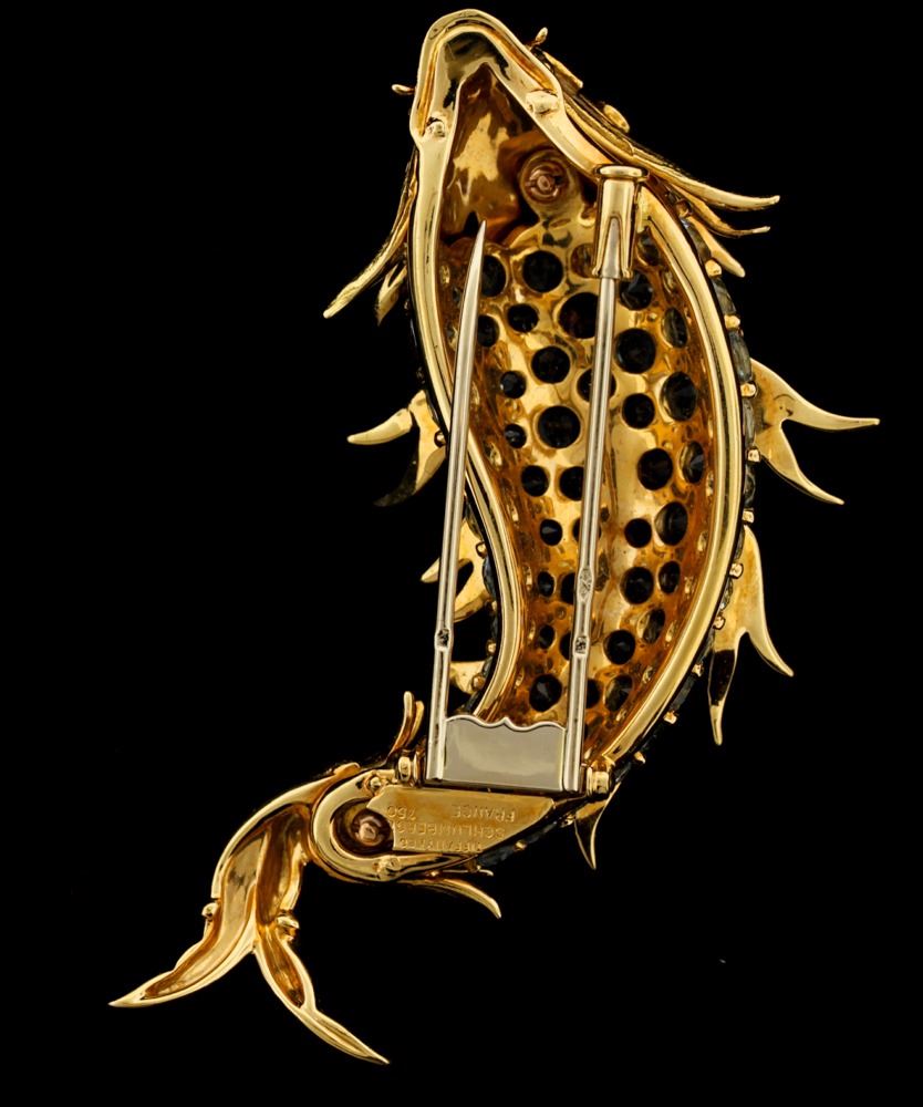 BROOCH Ladies 18ky Dauphin fish brooch by Jean Schlumberger for