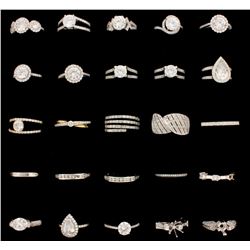 RINGS:  [11] Assorted 18KWG wedding rings by Danhov set with round diamonds, approx. 5.13 cttw., goo