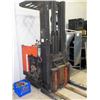 Image 1 : RAYMOND REACH IN/OUT ELECTRIC STAND UP FORKLIFT, 36 VOLT