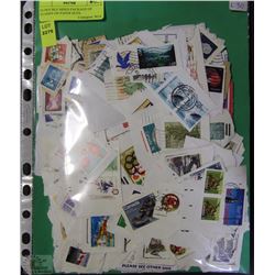 D) DOUBLE SIDED PACKAGE OF STAMPS ON PAPER NOTE