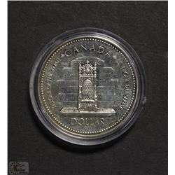 C) CANADIAN SILVER DOLLAR 1977