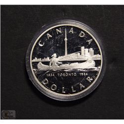 E) CANADIAN SILVER DOLLAR 1984