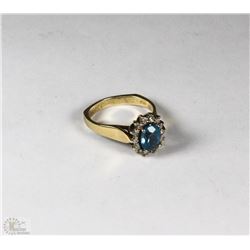 TRP102 14K BLUE TOPAZ AND DIAMOND 0.21CT RING