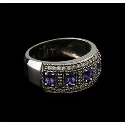 0.68ctw Tanzanite and Diamond Ring - 14KT White Gold