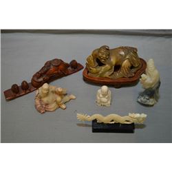 Selection of hand carved Oriental miniature figures including signed stone pieces, treenware and two