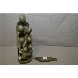Two hand carved soapstone sculptures including 12  circle of friends and a 6  lounging seal
