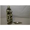 Image 1 : Two hand carved soapstone sculptures including 12" circle of friends and a 6" lounging seal