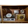 Image 2 : Shelf lot of assorted clocks including mantle, travel, etc plus barometers and parts