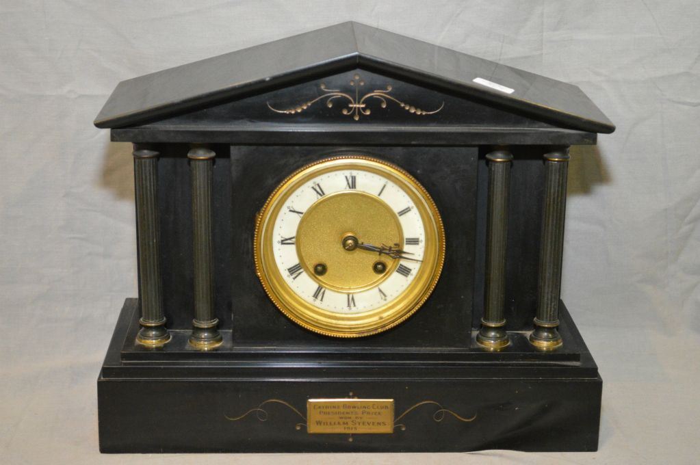 Antique slate mantle clock with Grecian column decoration
