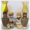 Image 1 : PAIR OF VINTAGE OIL LAMPS BOY AND GIRL