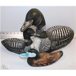 TWO CLOTH LOONS WITH A HAND CARVED DUCK