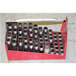 RED METAL CASE FULL OF 1 INCH NIPPLES