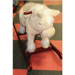 RIDING ROCKING MUSICAL INTERACTIVE HORSE ON