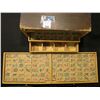 Image 1 : Old Wooden box in poor condition, one brass hinge left intact containing many pieces of a Mahjong se
