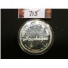 Image 2 : "The University of Iowa/Hawkeyes/One Troy Ounce .999 Fine Silver", depicts a stylized Hawk head on t