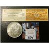 Image 1 : 1900 P Morgan Silver Dollar, AU & a two part attached Passenger tickets for "Lackawanna & Wyoming Va
