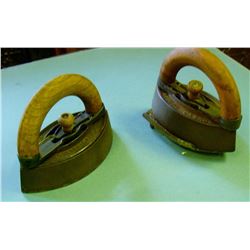 2 Sad Irons, handles and 1 trivet