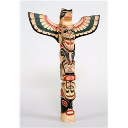 Northwest Coast Totem Carved with Thunderbird and Bear Holding a Copper and Mask 11" H. 7 1/2" W.  G