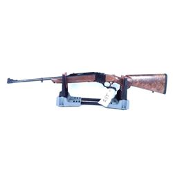 Yes. Ruger # 1 in .303 British. Look at the furniture