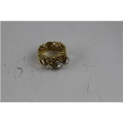 18K YELLOW AND GOLD LADIES RING (2 RINGS SOLDERED TOGETHER) SET WITH 3 BRILLIANT CUT DIAMONDS (1 IS