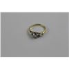 Image 1 : 14K YELLOW AND WHITE GOLD LADIES ENGAGEMENT RING SET WITH ONE BRILLIANT CUT DIAMOND AND 2 SILVER