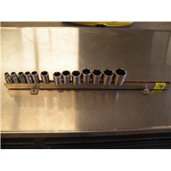 Snap-on & Matco 1/2 drive sockets on magnetic strip