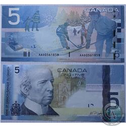 2006 Bank of Canada Error $5, BC-67b, S/N: AAD0561859 AU-UNC.  A very interesting error where a shee