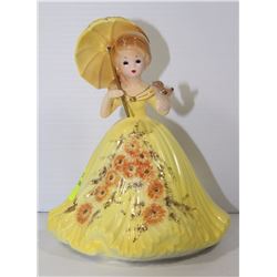 LADY WITH BIRD FIGURINE