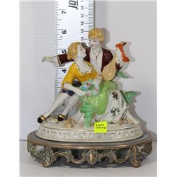 METAL BASE MAN AND WOMAN ORNAMENTS