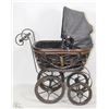 Image 1 : WOOD DOLL CARRIAGE ON WHEELS