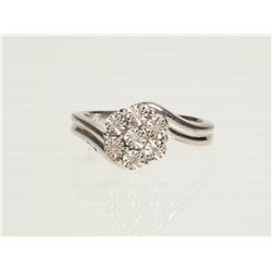 STERLING SILVER '7 DIAMOND' RING. REPLACEMENT VALUE: $420.00