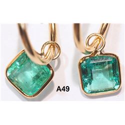 14KT GOLD EMERALD 1.60CT HOOP EARRINGS. REPLACEMENT VALUE: $2640.00