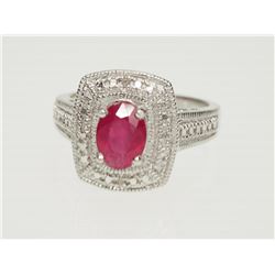 STERLING SILVER RING SET WITH AN ENCHANTED RUBY WITH 4 DIAMONDS.  REPLACEMENT