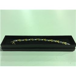 SILVER & GOLD TONE XO BRACELET SET WITH 10 DIAMONDS RETAIL VALUE $300.00